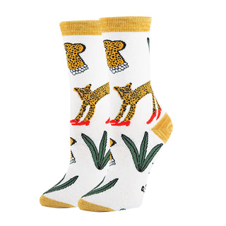 Socks with cheetah print and yellow accents on a white background