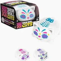 Colorful dice with cat designs on a white background