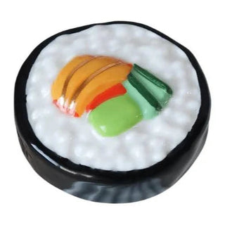 Sushi-shaped object with rice and colorful fillings on a white background