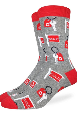 Gray socks with red accents and property-related graphics on a white background