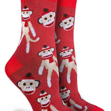 Red socks with monkey pattern on a white background