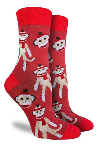 Red socks with monkey pattern on a white background